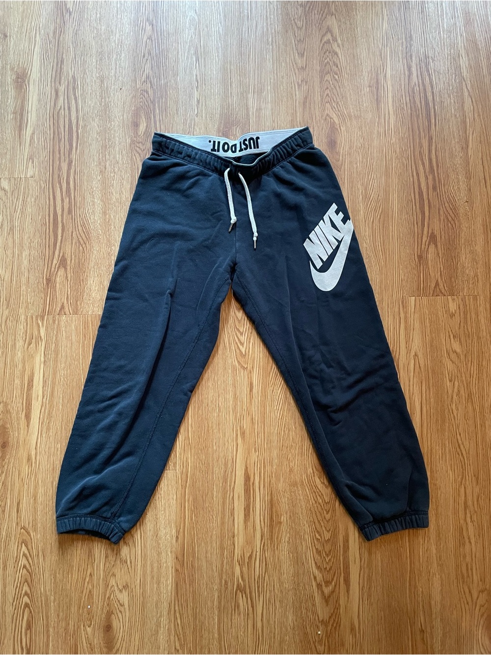 Nike Black Sweatpants with White Swoosh Logo